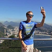 Wesley A. taking a selfie at a city viewpoint